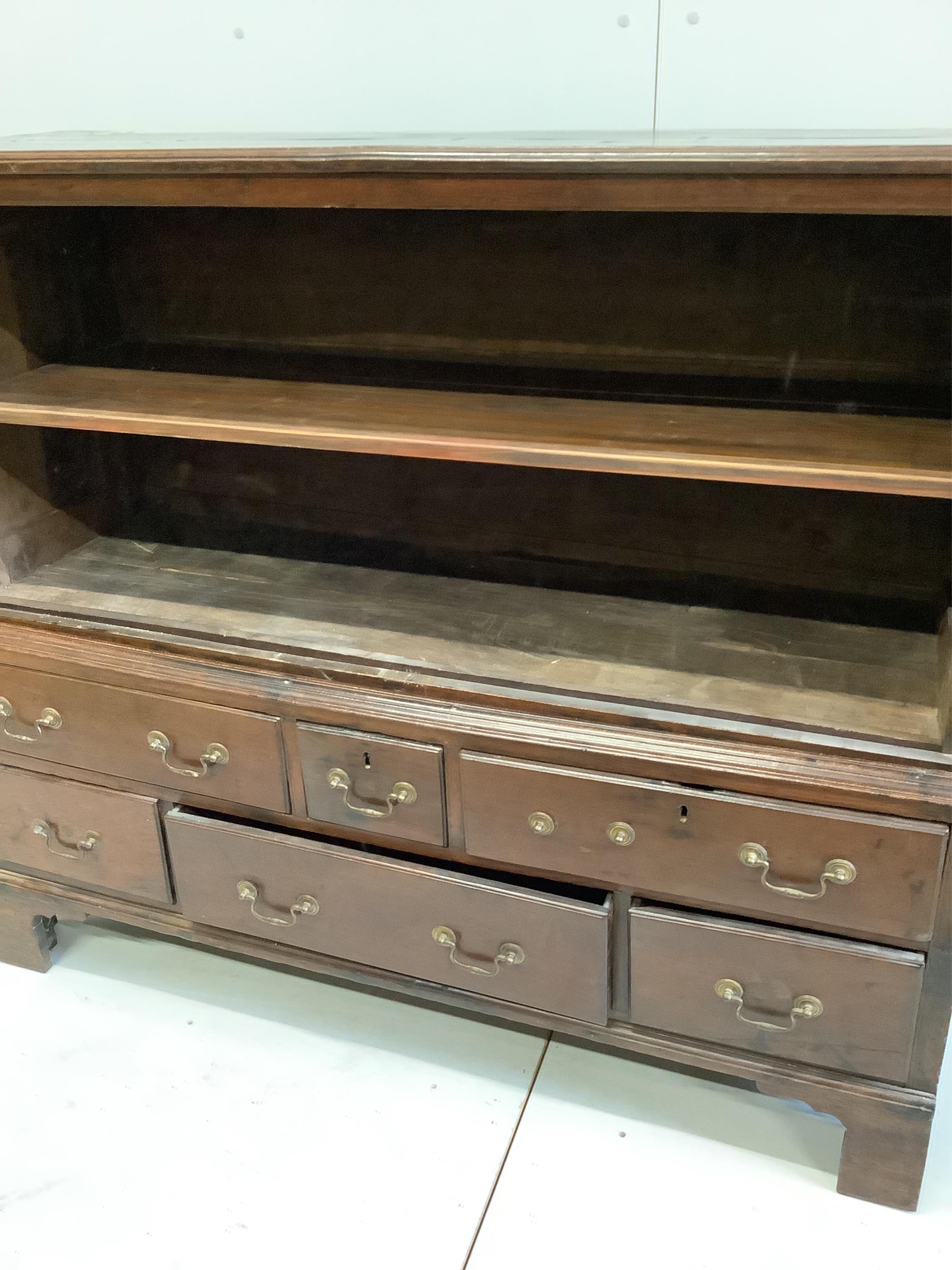 An 18th century oak mule chest, width 141cm, depth 52cm, height 122cm. Condition - fair